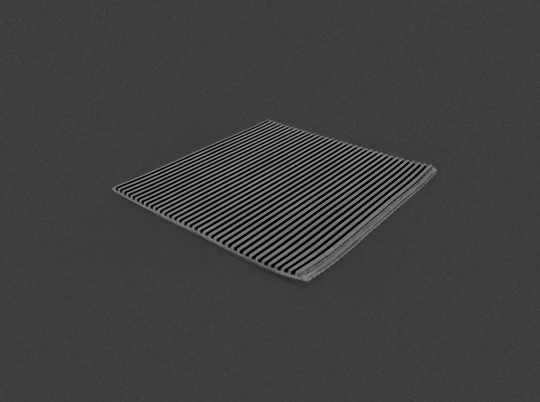 Cut-to-size HVAC vibration isolation pads for supporting rooftop and mechanical equipment